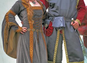 Gewandete Künstler im Mittelalter